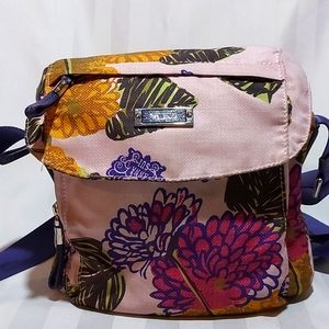 11. TUMI NYLON TRAVEL CROSSBODY BAG!